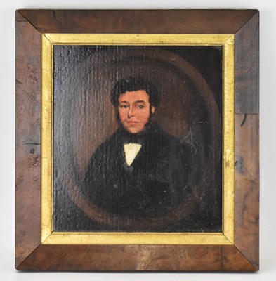 Lot 423 - A 19th century oil on board, portrait of a...