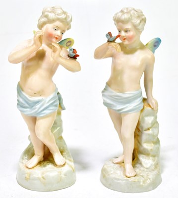 Lot 1266 - A pair of Continental porcelain figures of...