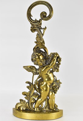 Lot 183 - A Victorian brass cherub doorstop, height 49cm.