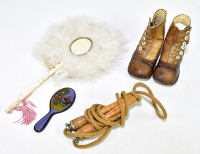 Lot 1076 - A bone handled hand mirror, together with a...