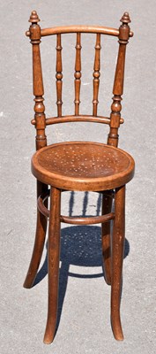 Lot 1611 - A Victorian beech spindle back correction chair.