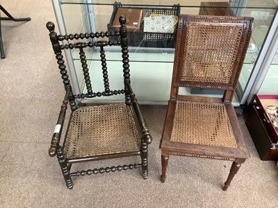 Lot 1612 - A Victorian stained bobbin and cane seated...