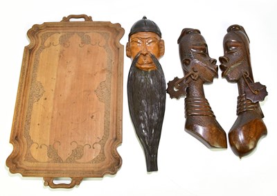 Lot 1119 - A collection of African and Thai carved items...