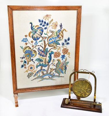 Lot 1024 - An early 20th century brass dinner gong on oak...