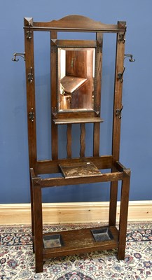Lot 1613 - A 1920s/30s oak hall stand with central...
