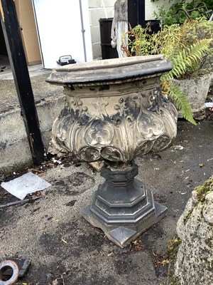 Lot 1523A - A antique stone font / planter on stand in the...