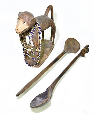 Lot 1122 - Two African tribal oversized spoons/scoops,...