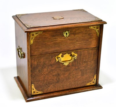 Lot 1025 - A 1920s brass bound stationery box with...