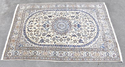 Lot 1502 - A cream ground fine Nain carpet, 235 x 345cm.