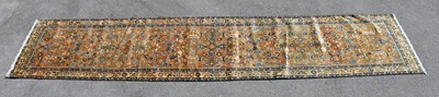 Lot 1507 - An orange ground Karajeh style runner, 400 x...