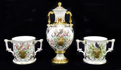 Lot 1352 - ROYAL CROWN DERBY; a twin handled lidded...