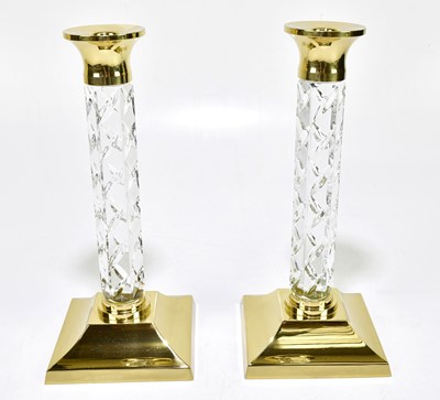 Lot 1226 - WATERFORD; a pair of cut glass and brass...