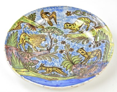 Lot 1564 - A 19th century tin glazed bowl, polychrome...
