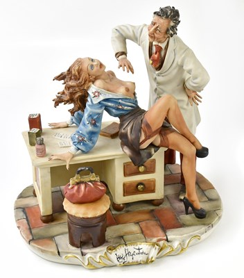 Lot 1268 - CAPODIMONTE; a figure group of doctor and...