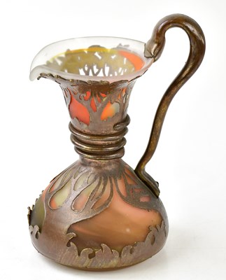 Lot 1452 - AMA; a copper and glass jug, height 25cm.