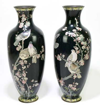 Lot 1202 - A pair of Japanese cloisonne vases decorated...