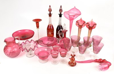 Lot 1217 - A quantity of cranberry glass to include...