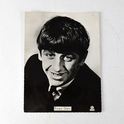 Lot 229 - RINGO STARR; a black and white photograph of...