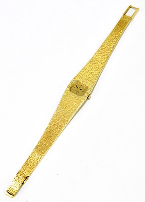 Lot 1630 - OMEGA; an 18ct yellow gold lady's vintage...