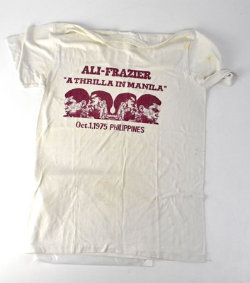 Lot 791 - MUHAMMAD ALI AND JOE FRAZIER; an original ‘A...