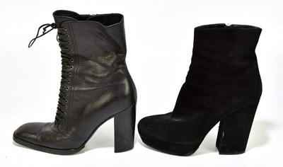 Lot 788 - YVES SAINT LAURENT; a pair of black heeled...