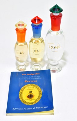 Lot 618 - ROCHAS; three Tocade dummy perfume bottles in...