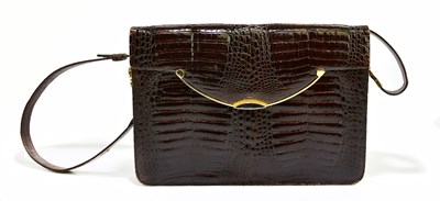 Lot 704 - ALFRED ROTH; a 1950s vintage brown crocodile...