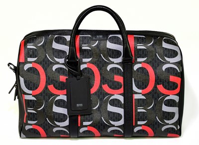Lot 622 - HUGO BOSS; an unused black, grey and red...