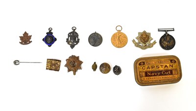 Lot 401 - A pair of WWI medals awarded to Pte 17/34082 E....