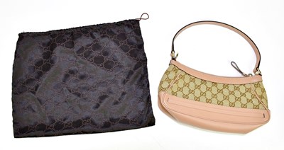 Lot 663 - GUCCI; a nude leather and beige monogram...