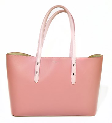 Lot 674 - ASPINAL OF LONDON; a large pink leather tote...