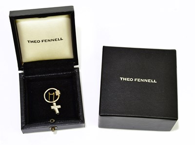 Lot 590 - THEO FENNELL; an 18ct white gold circular...