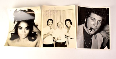 Lot 563 - TOM JONES; a black and white portrait...
