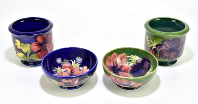 Lot 1770 - MOORCROFT; two footed bowls decorated in...