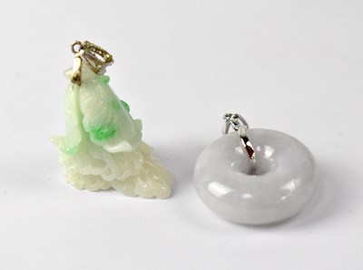 Lot 984 - A green jade pendant