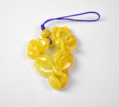 Lot 988 - A yellow jade pendant