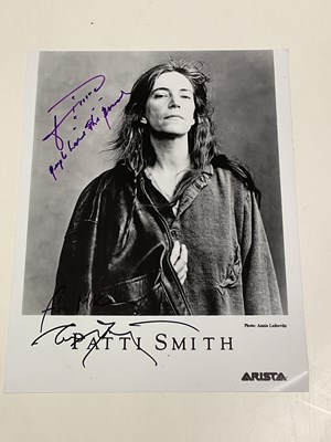 Lot 2102 - PATTI SMITH; a black and white photograph...