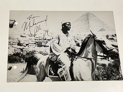 Lot 2362 - Muhammad Ali; a black and white photograph of...
