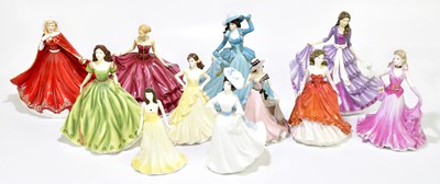 Lot 1105A - Eleven porcelain figures, including three...