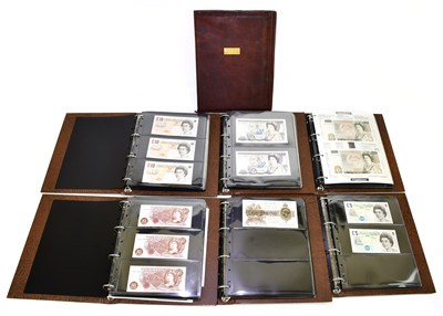 Lot 1030A - A collection of UK bank notes, ten shilling,...