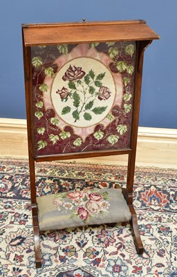 Lot 1641 - A late 19th century mahogany fire screen,...