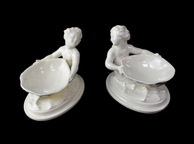 Lot 249 - ROYAL WORCESTER; a pair of blanc de Chine...