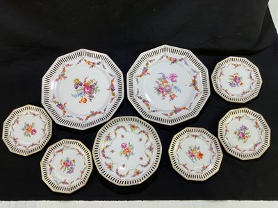 Lot 1637 - SCHUMANN; a set of eight floral decorated...