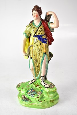 Lot 284 - A Staffordshire figure of Diana the huntress,...