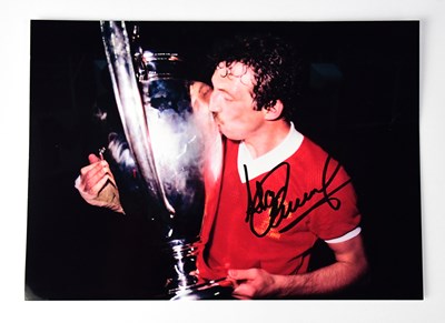Lot 483 - A colour photograph bearing the signature of...
