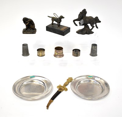 Lot 154 - A collectors' lot comprising a bronzed model of a dog