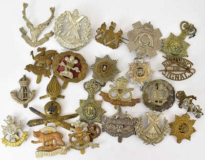 Lot 404 - Twenty-three various military cap badges (23).