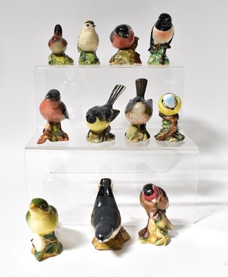Lot 294 - BESWICK; eleven models of birds comprising...