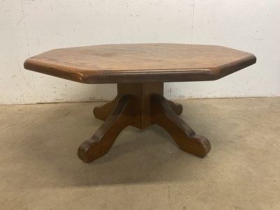Lot 467 - Oak octagonal table. 45cm high, 99cm diameter.