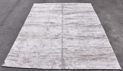 Lot 2275 - OKA; a decorative Skye rug, 307 x 250cm.